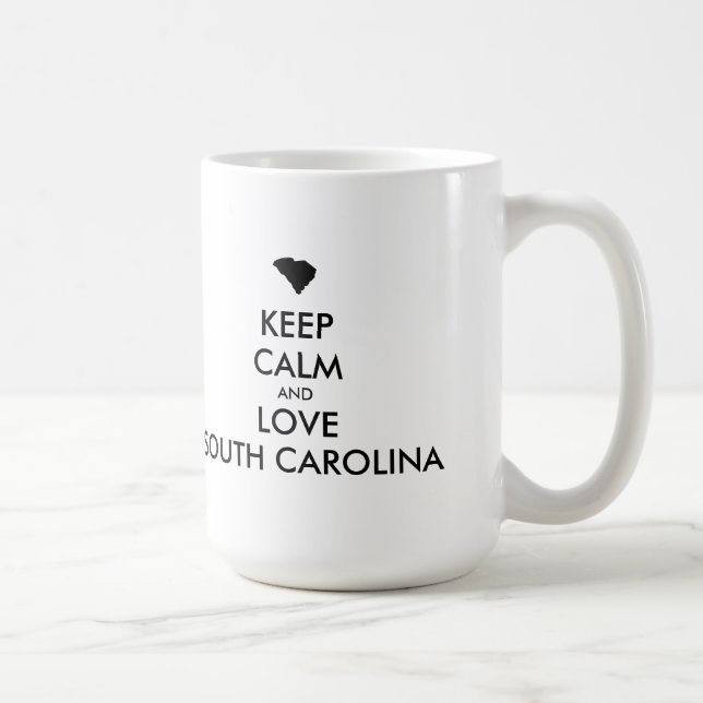 TAZA DE CAFÉ PERSONALIZABLE MANTENGA LA CALMA Y AME A CAROLINA  (Derecha)