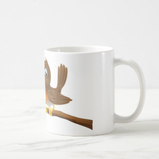 Taza De Café Petirrojo lindo que se sienta en una rama de árbol