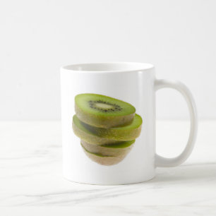 Taza De Café Pila de fruta de kiwi cortada