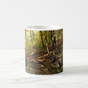 Taza De Café Pistas a través de las maderas