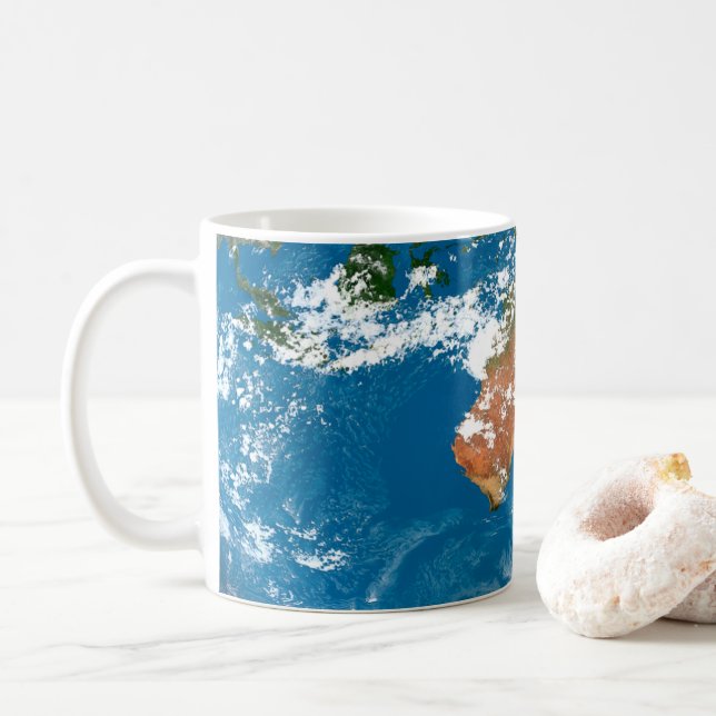 Taza De Café Planeta Tierra Mostrando Nubes Sobre Australia. (Con donut)