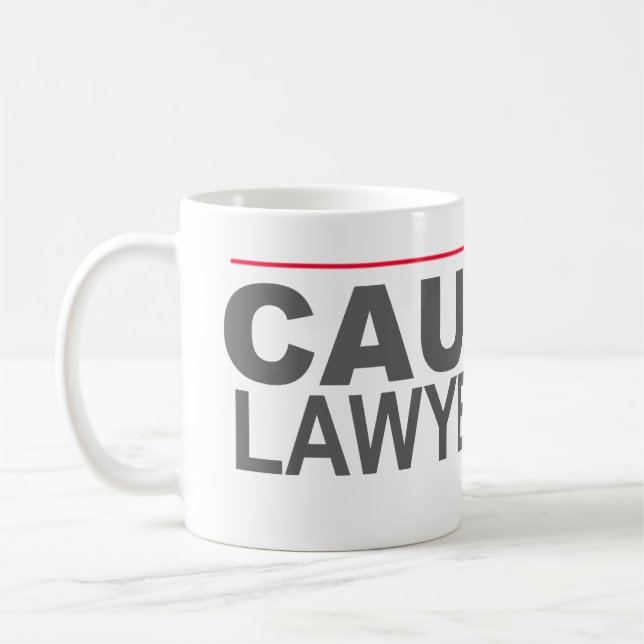 TAZA DE CAFÉ "PRECAUCIÓN LAWYERED PARA ARRIBA" -- (Izquierda)