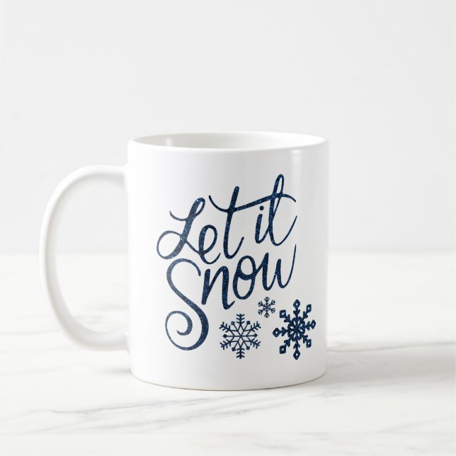 Taza De Café Que nieve Navidades Mug (Izquierda)