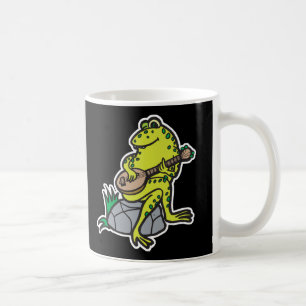 Taza De Café rana tonta tocando la guitarra