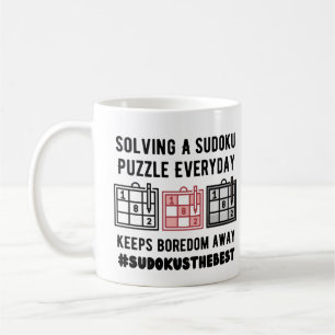 Taza De Café Resolver un rompecabezas de sudoku todos los días