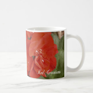 Taza de café roja del geranio