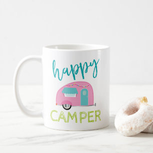 Taza de café rosada del campista contento