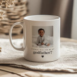 Taza De Café ¿Serás mi propuesta de foto de padrino?<br><div class="desc">¿Buscando una manera dulce y significativa de pedirle a un ser querido que sea el padrino de tu bebé? ¡Este moderno y minimalista diseño de taza es la forma perfecta de plantear la pregunta! Ya sea que le preguntes a un miembro de la familia o a amigos cercanos, esta etiqueta...</div>