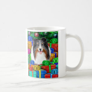 Taza De Café Sheltie Navidades abren regalos azul Merle