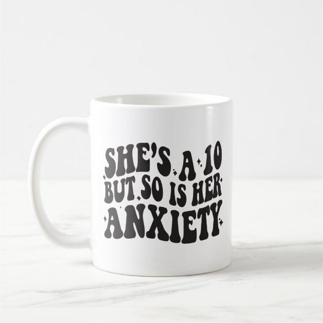Taza De Café She's a 10 but so is her anxiety (Izquierda)
