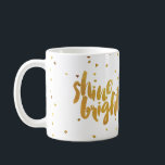Taza De Café Shine Bright Faux Gold Letter<br><div class="desc">¡Esta elegante taza dorada con letras es perfecta para recordarte cada día a "brillar" y superar la adversidad! Con un fondo dorado de confeti,  seguro que te alegrarás el día.</div>