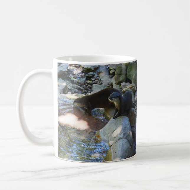 Taza De Café **"Sips by the Stream: Las nutrias se beben del rí (Izquierda)