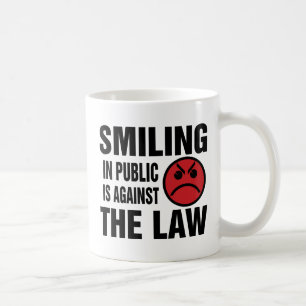 Taza De Café Sonreír en público es ilegal