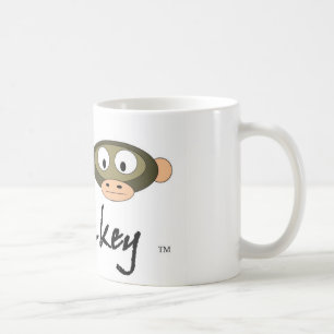 Taza de café sucia del mono