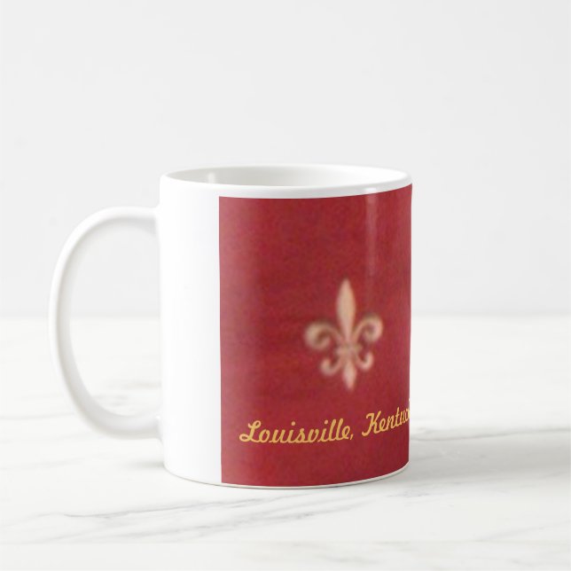 TAZA DE CAFÉ "TAZA DE LA FLOR DE LIS DE LOUISVILLE, KENTUCKY " (Izquierda)