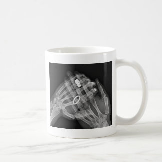 Taza De Café Tenencia de la mano