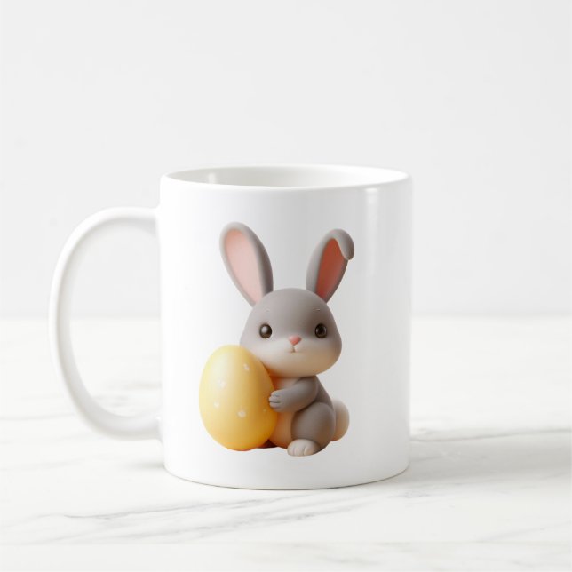 Taza De Café Título: Conejo de Pascua 3D con un huevo vibrante (Izquierda)