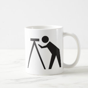 Taza De Café Topógrafo de la tierra en el trabajo