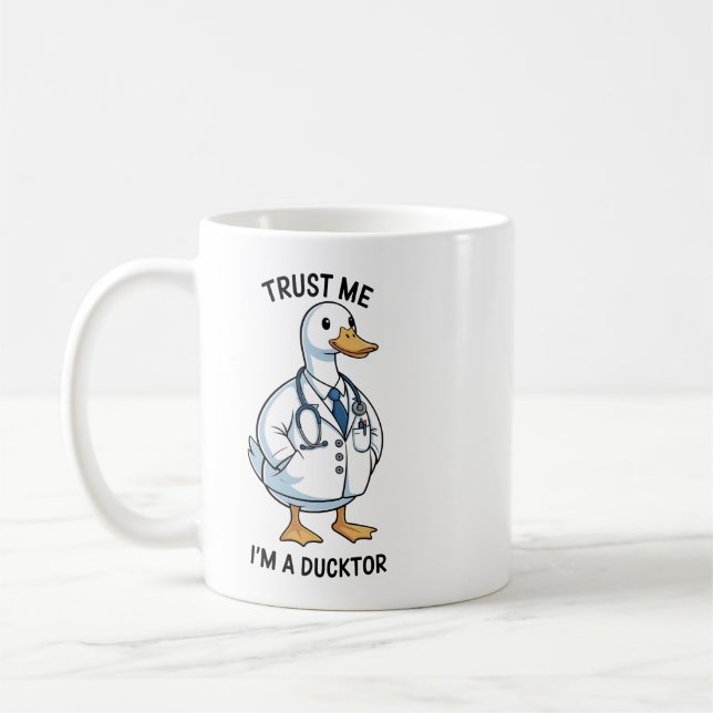 Taza De Café Trust Me I’m a Ducktor Funny Doctor Day (Izquierda)