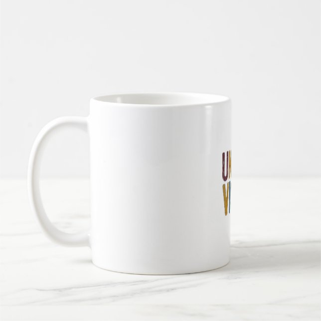 Taza De Café Unidos por Vision. (Izquierda)