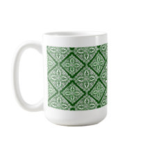 Taza de café verde de los medallones