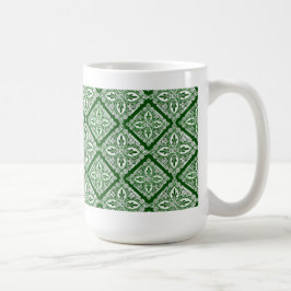 Taza de café verde de los medallones
