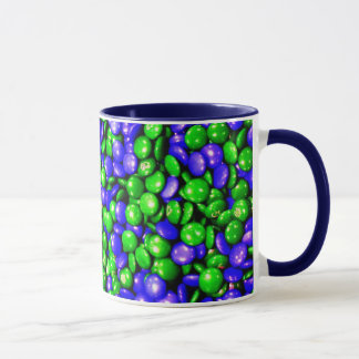 Taza de café verde y azul de los maniquíes