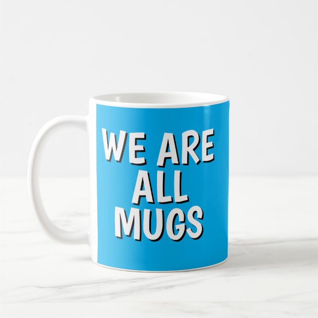 Taza De Café "We Are All Mugs” Mug – Cheeky Ceramic Blue (Izquierda)