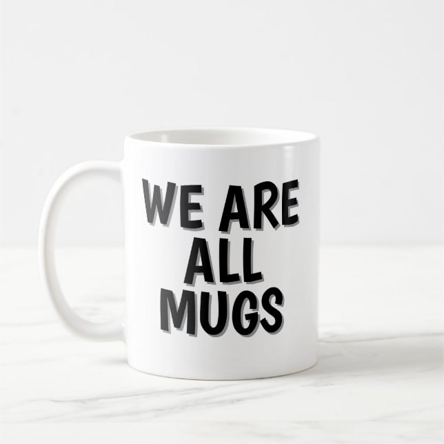 Taza De Café We Are All Mugs” Mug – Cheeky Ceramic Coffee Cup (Izquierda)