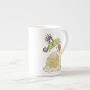 Taza de China de la muñeca de trapo