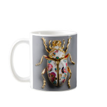 TAZA  DE COLOR BLANCO CON IMPRESION DE ESCARABAJO 