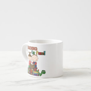 Taza De Espresso La figura lectura del palillo de los niños es dive