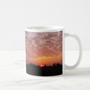 Taza de la belleza de la puesta del sol