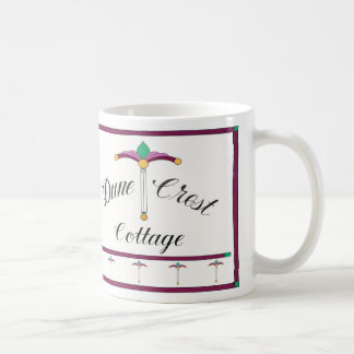 Taza de la cabaña del escudo de la duna