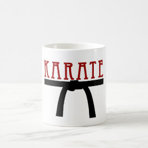 Taza de la correa negra del karate
