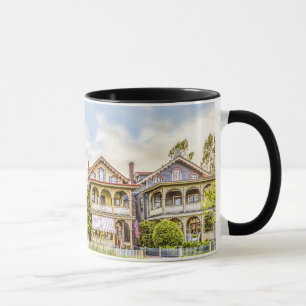 Taza de la fila de la casa del Victorian
