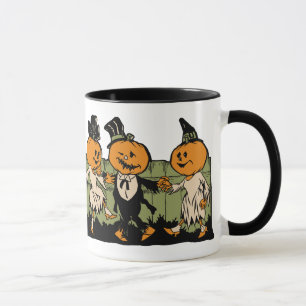 Taza de la gente de la calabaza de Halloween del