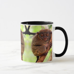 Taza de la manija del negro de Tarsier