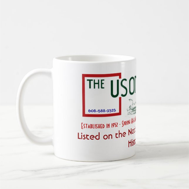 Taza de la obra clásica del logotipo del mesón de (Izquierda)