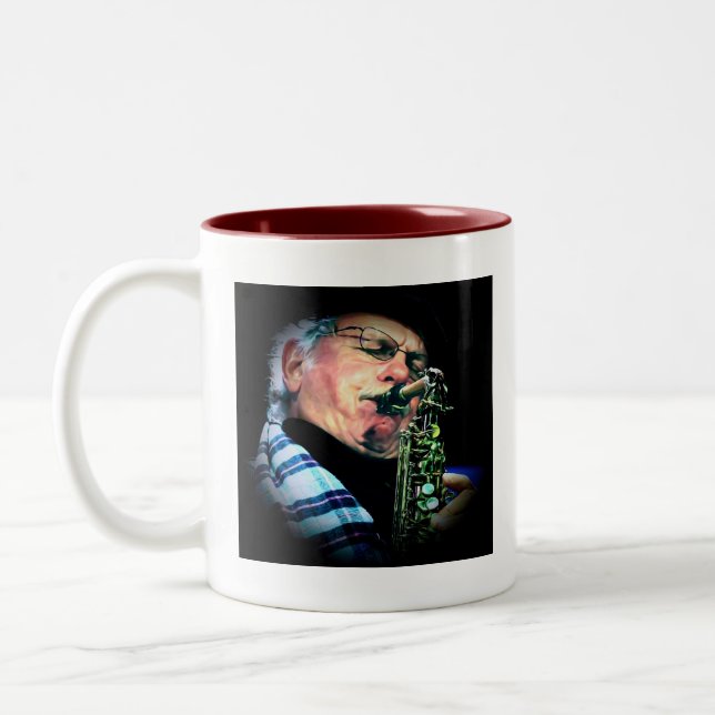 Taza de la orquesta de la locura del alto del col (Izquierda)