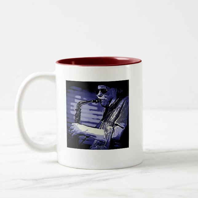 Taza de la orquesta de la locura del alto del col (Izquierda)