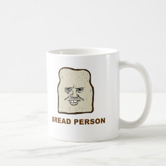 Taza de la persona del pan