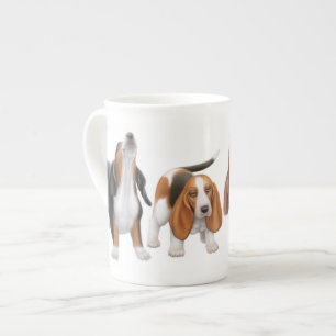 Taza de la porcelana de hueso de los perros de