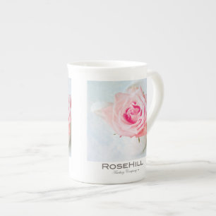 Taza de la porcelana de hueso de los rosas del