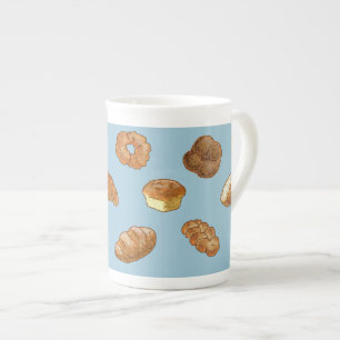 Taza de la porcelana de hueso del modelo del pan -