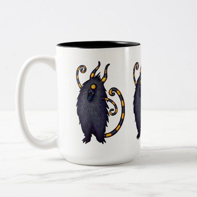 Taza de las criaturas de Feeping - monstruo rayado (Izquierda)