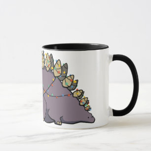 Taza de las luces de navidad del Stegosaurus