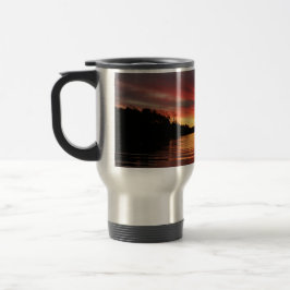 Taza de oro del viaje de la puesta del sol