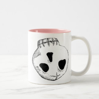 Taza de papel del cráneo