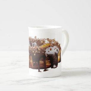 Taza De Porcelana Donut decadente de SlipperyJoe's cubierto con un g
